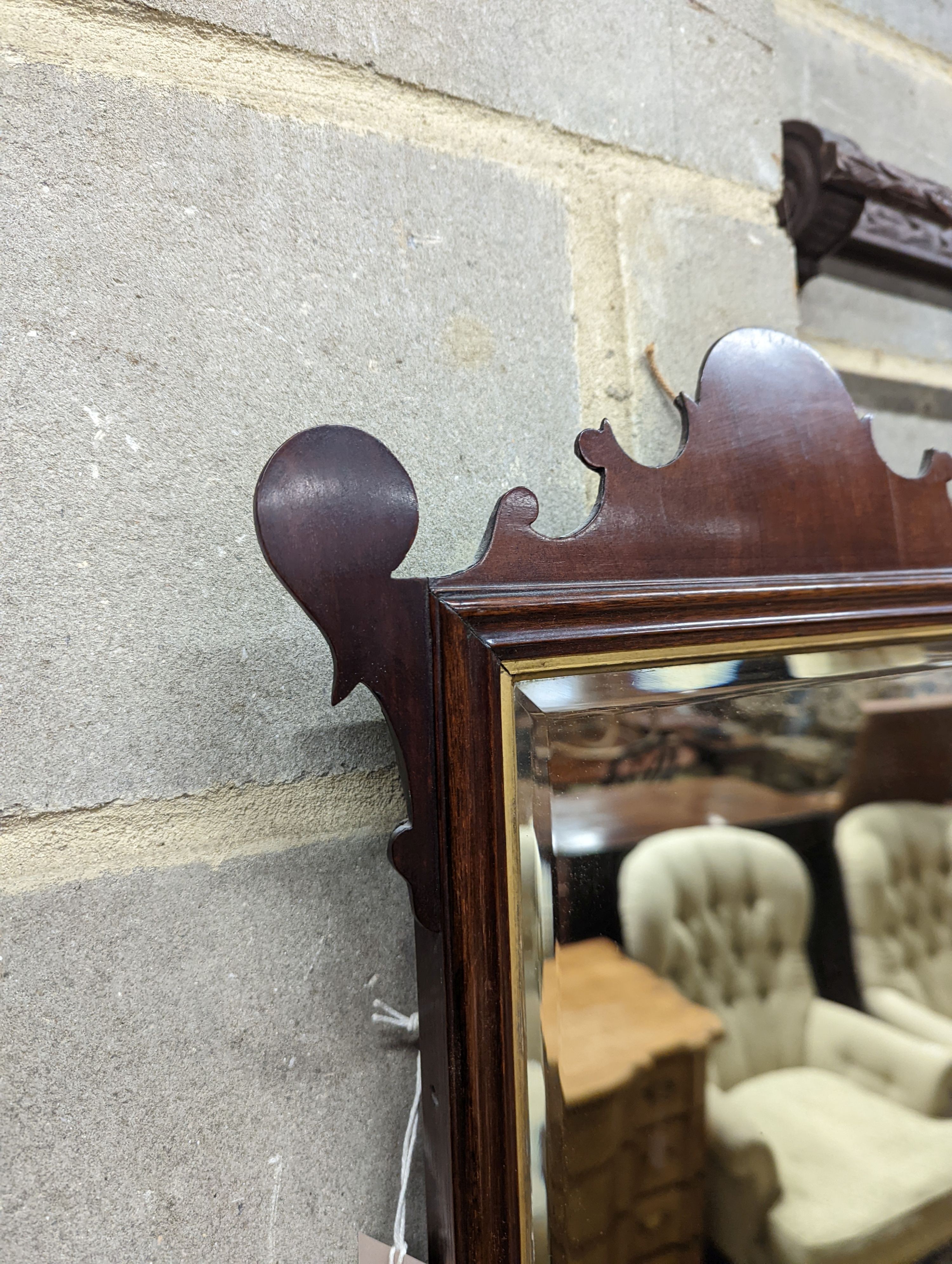A George III mahogany fret frame wall mirror, height 63cm, width 39cm